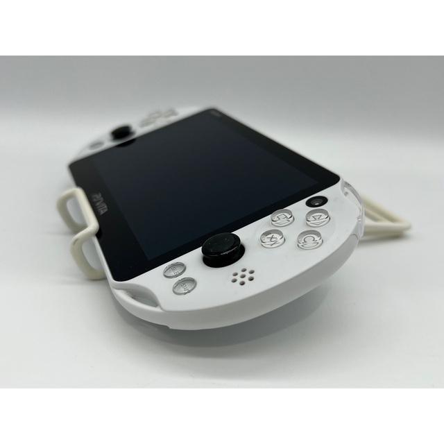 PlayStation Vita(プレイステーションヴィータ)の【完品・液晶美品】PS Vita PCH-2000 ホワイト 本体 ソニー エンタメ/ホビーのゲームソフト/ゲーム機本体(携帯用ゲーム機本体)の商品写真