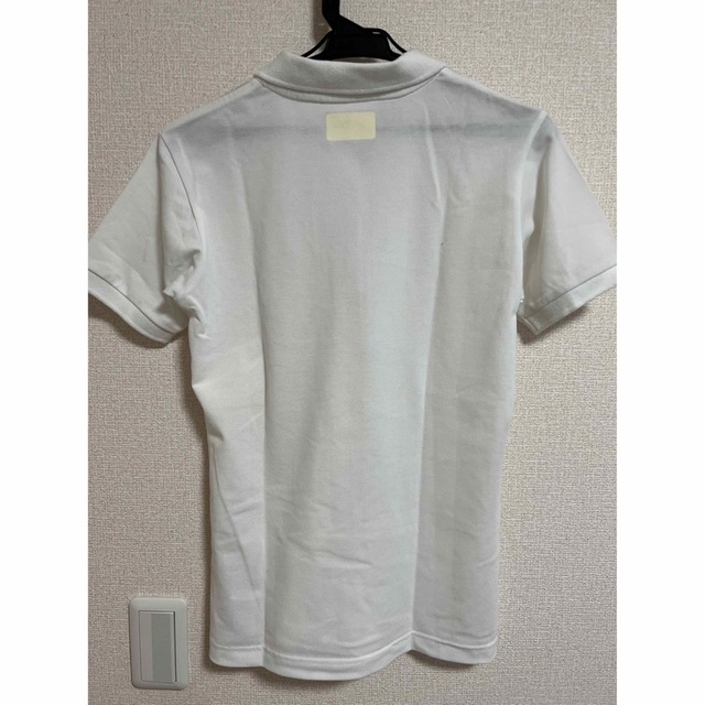 LACOSTE(ラコステ)のラコステ　ポロシャツ　白　Mサイズ レディースのトップス(ポロシャツ)の商品写真