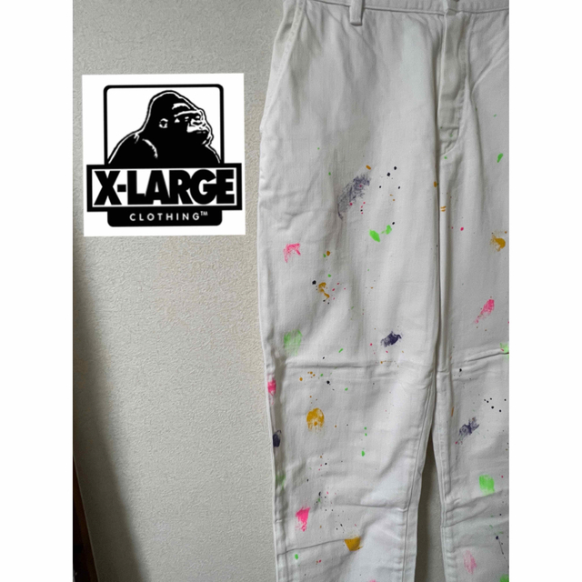 XLARGE(エクストララージ)の最終値下げXLARGE ペイント　ワークパンツ　ホワイト　サイズ 30 ダボダボ メンズのパンツ(ワークパンツ/カーゴパンツ)の商品写真