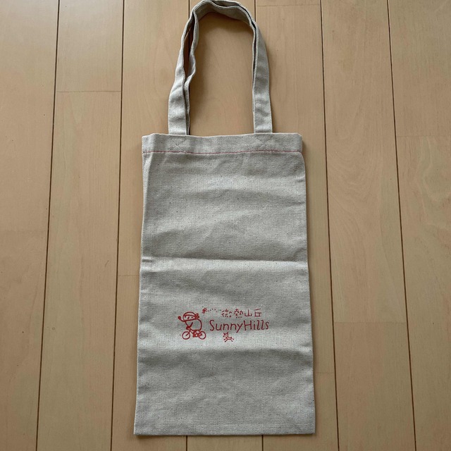 サニーヒルズ　袋　バッグ　微熱山丘 レディースのバッグ(ショップ袋)の商品写真