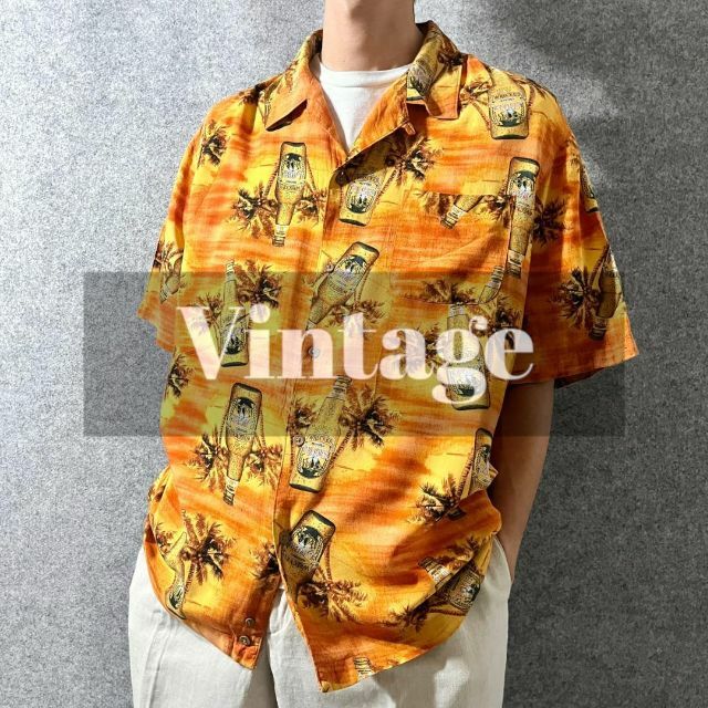 ART VINTAGE(アートヴィンテージ)の【vintage】ビール&ヤシの木 総柄 レーヨン アロハシャツ オレンジ XL メンズのトップス(シャツ)の商品写真