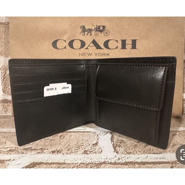 COACH(コーチ)のcoach  シグネチャーブラック　折財布　黒　プレゼント　メンズ メンズのファッション小物(折り財布)の商品写真