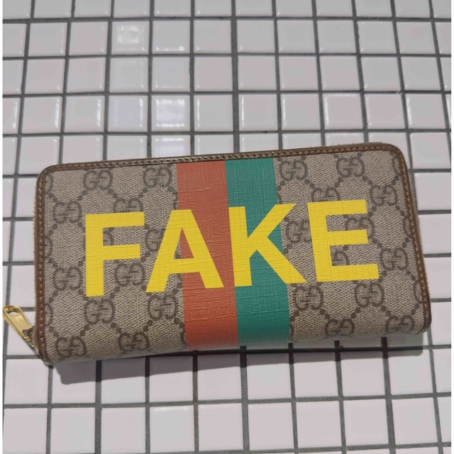 GUCCI FAKE NOT 長財布 GGスプリーム ジップ | フリマアプリ ラクマ