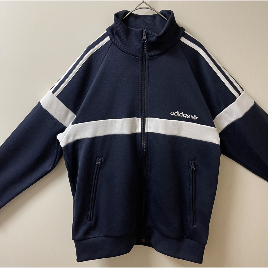 adidas(アディダス)のほぼ新品】adidasトラックジャケット美品ビンテージ白青紺トレファイルネイビー メンズのトップス(ジャージ)の商品写真