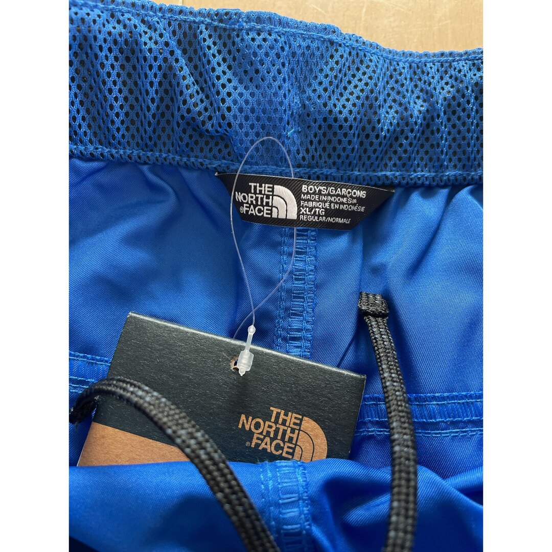 THE NORTH FACE(ザノースフェイス)のThe North Face ボーイズ水着　XL 新品未使用 キッズ/ベビー/マタニティのキッズ服男の子用(90cm~)(水着)の商品写真