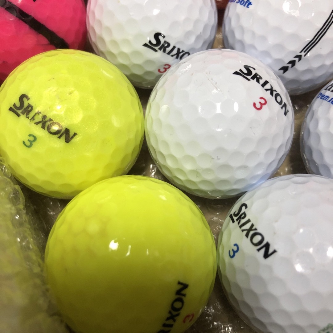Srixon(スリクソン)の【中古】 スリクソン他　ゴルフボール　ロストボール　20個　ティー4本付 スポーツ/アウトドアのゴルフ(その他)の商品写真