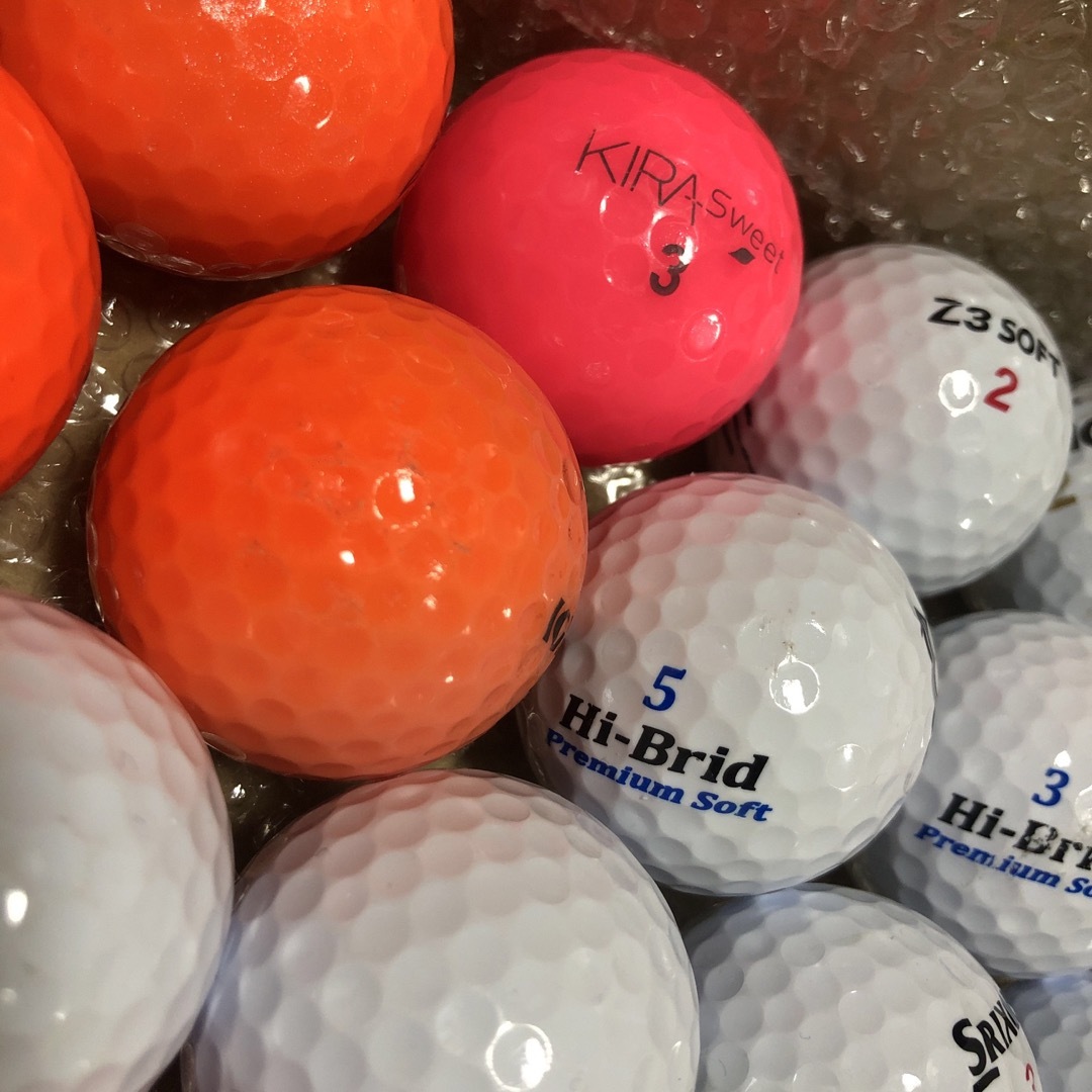 Srixon(スリクソン)の【中古】 スリクソン他　ゴルフボール　ロストボール　20個　ティー4本付 スポーツ/アウトドアのゴルフ(その他)の商品写真