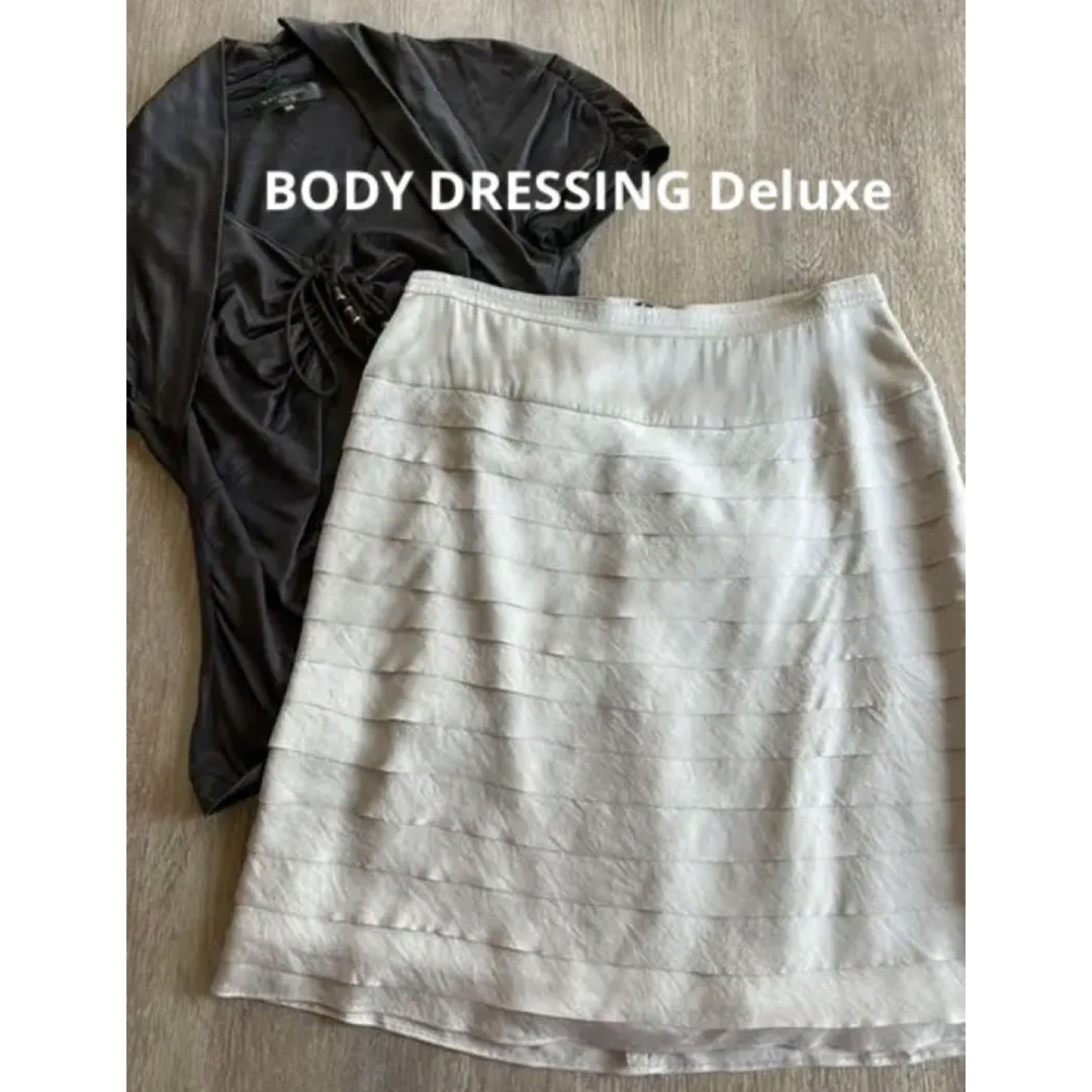 BODY DRESSING Deluxe(ボディドレッシングデラックス)のボディドレッシングデラックス　S M  フリル　スカート　ティアード　タイト レディースのスカート(ひざ丈スカート)の商品写真