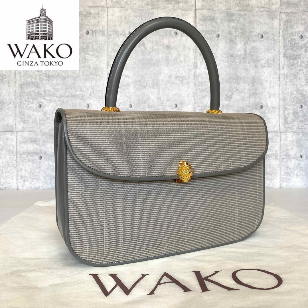 美品】WAKO 銀座和光 現行品 カーフレザー 黒 ゴールド金具 ハンドバッグ-