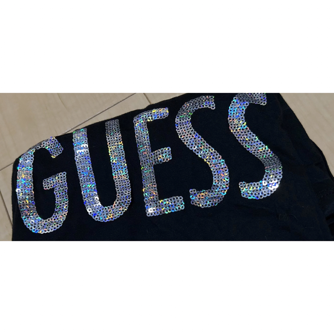 GUESS(ゲス)のGUESS ゲス　トップス　黒　ブラック　Tシャツ　ロゴ ブランド　スパンコール レディースのトップス(Tシャツ(半袖/袖なし))の商品写真