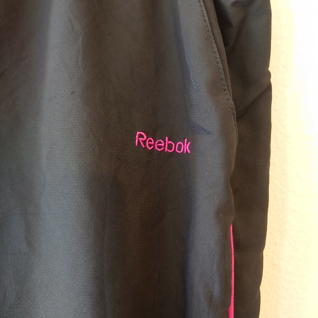 Reebok(リーボック)のReebok　リーボック　ナイロントラックパンツ　ブラック メンズのパンツ(その他)の商品写真