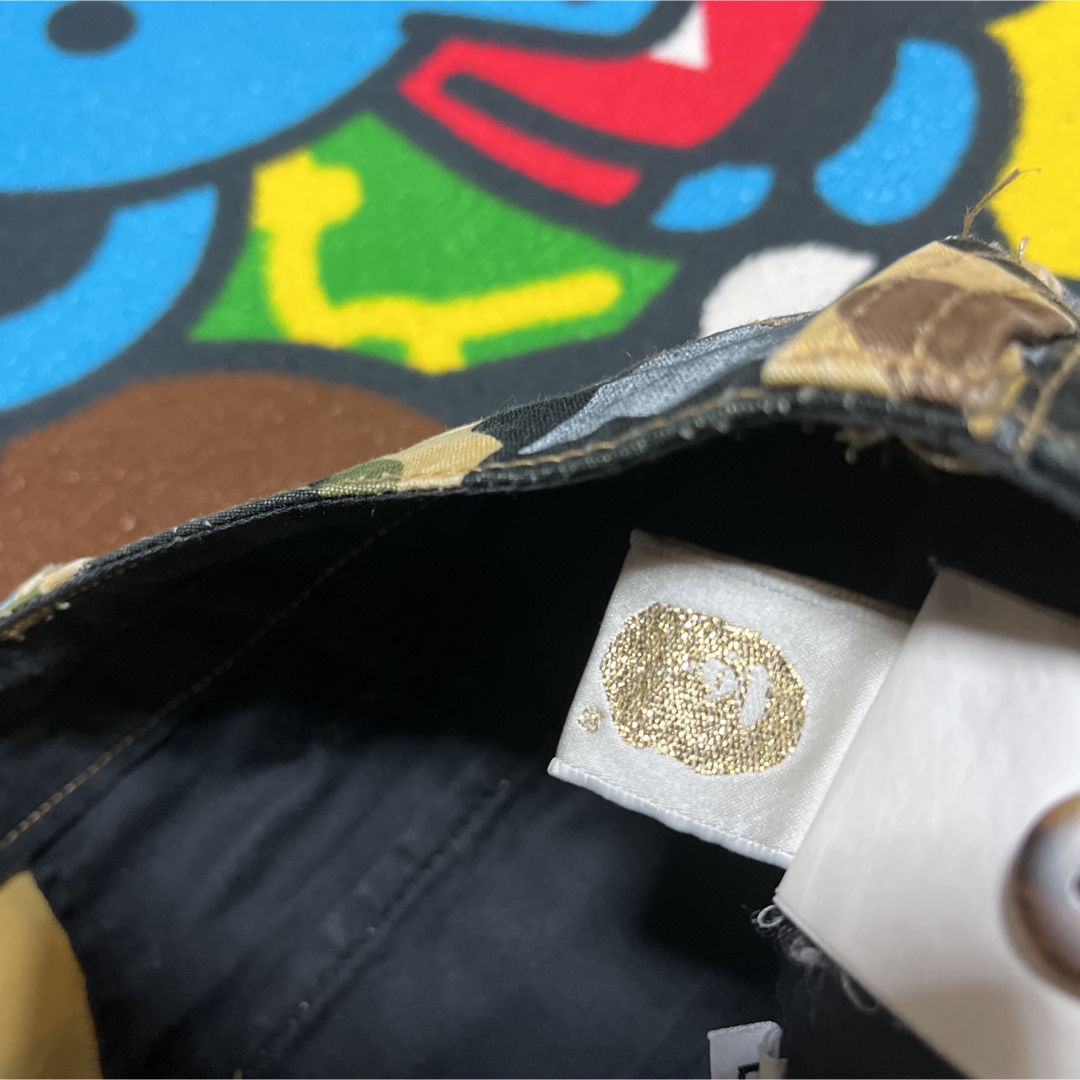 A BATHING APE(アベイシングエイプ)のAPE BAPE  KAWS 1st CAMO 迷彩　STA ショーツ　パンツ メンズのパンツ(ショートパンツ)の商品写真