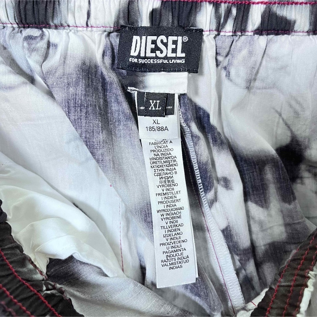 DIESEL(ディーゼル)のDIESEL ディーゼル 総柄 イージーパンツ XL メンズのパンツ(その他)の商品写真