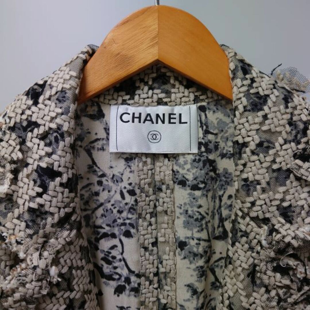 CHANEL(シャネル)のシャネル ジャケット 裏地ココマーク レース切替 リボン 白 黒 約Mサイズ レディースのジャケット/アウター(その他)の商品写真