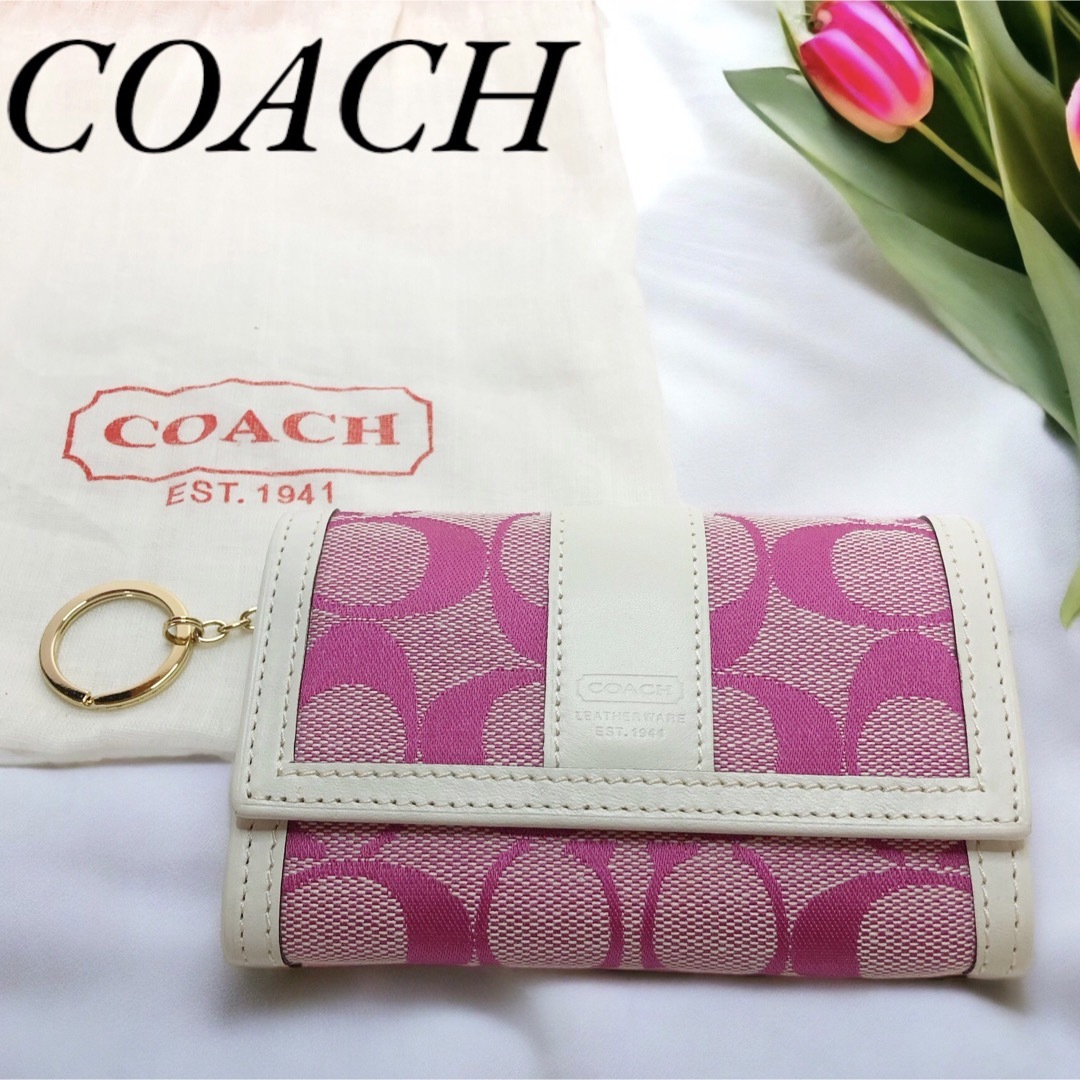 未使用✨■COACHコーチ■シグネチャー 白×ピンク 二つ折り財布 キーリング付 | フリマアプリ ラクマ
