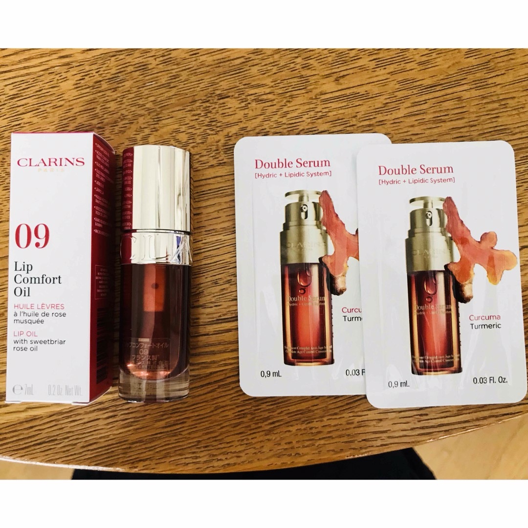 CLARINS(クラランス)のクラランス　リップコンフォートオイル（リニューアル品）09チョコレート コスメ/美容のベースメイク/化粧品(リップグロス)の商品写真