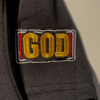 シマムラ(しまむら)のLサイズ　ミリオンゴッド　限定　Tシャツ　GOD 図柄　黒　ブラック(Tシャツ/カットソー(半袖/袖なし))