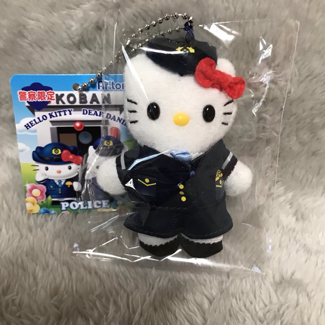 ハローキティ(ハローキティ)のハローキティ×POLICE マスコットキーホルダー エンタメ/ホビーのおもちゃ/ぬいぐるみ(キャラクターグッズ)の商品写真