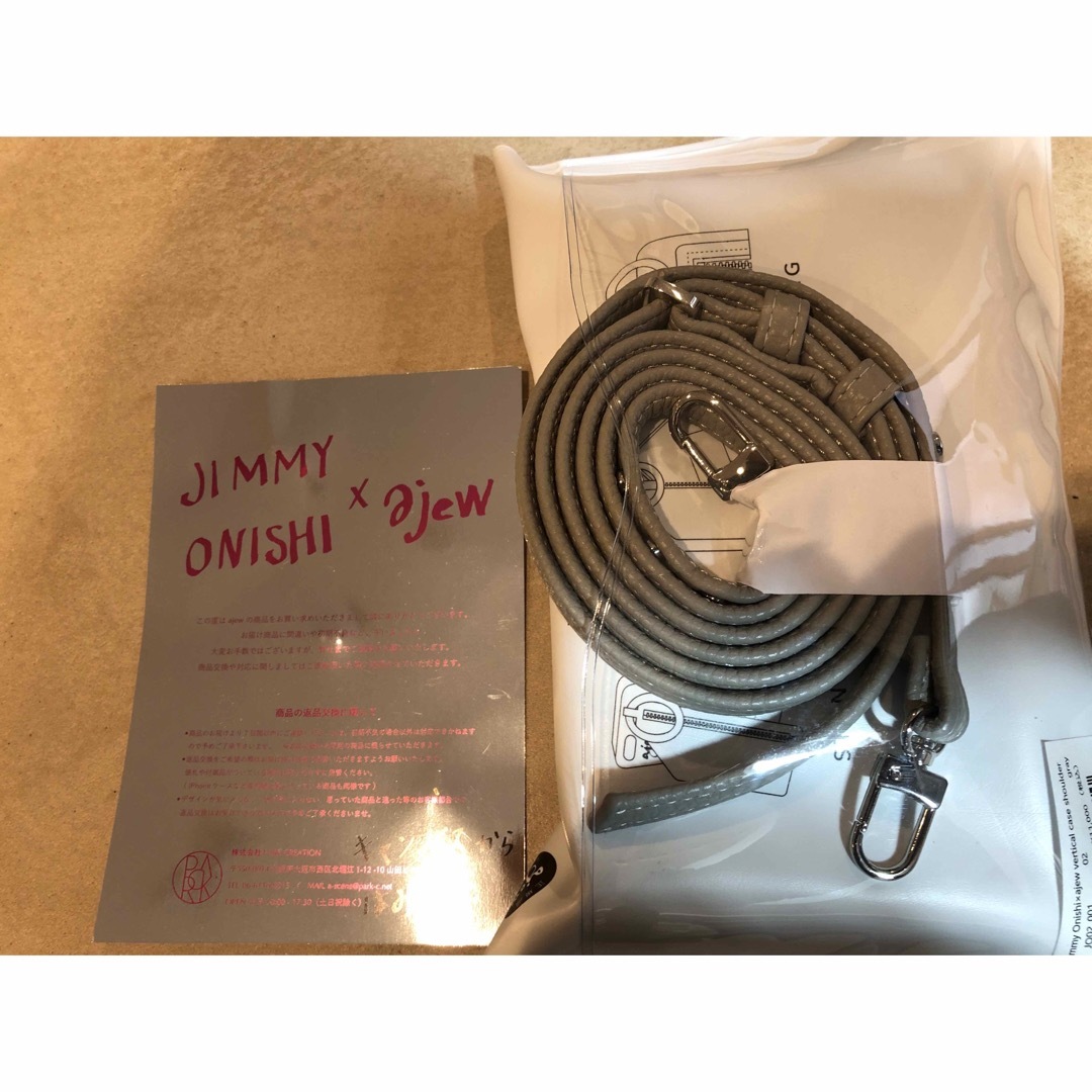 ajew(エジュー)の【新品】ジミー大西　ajew iPhone マルチケース　エジュー　スマホケース スマホ/家電/カメラのスマホアクセサリー(iPhoneケース)の商品写真