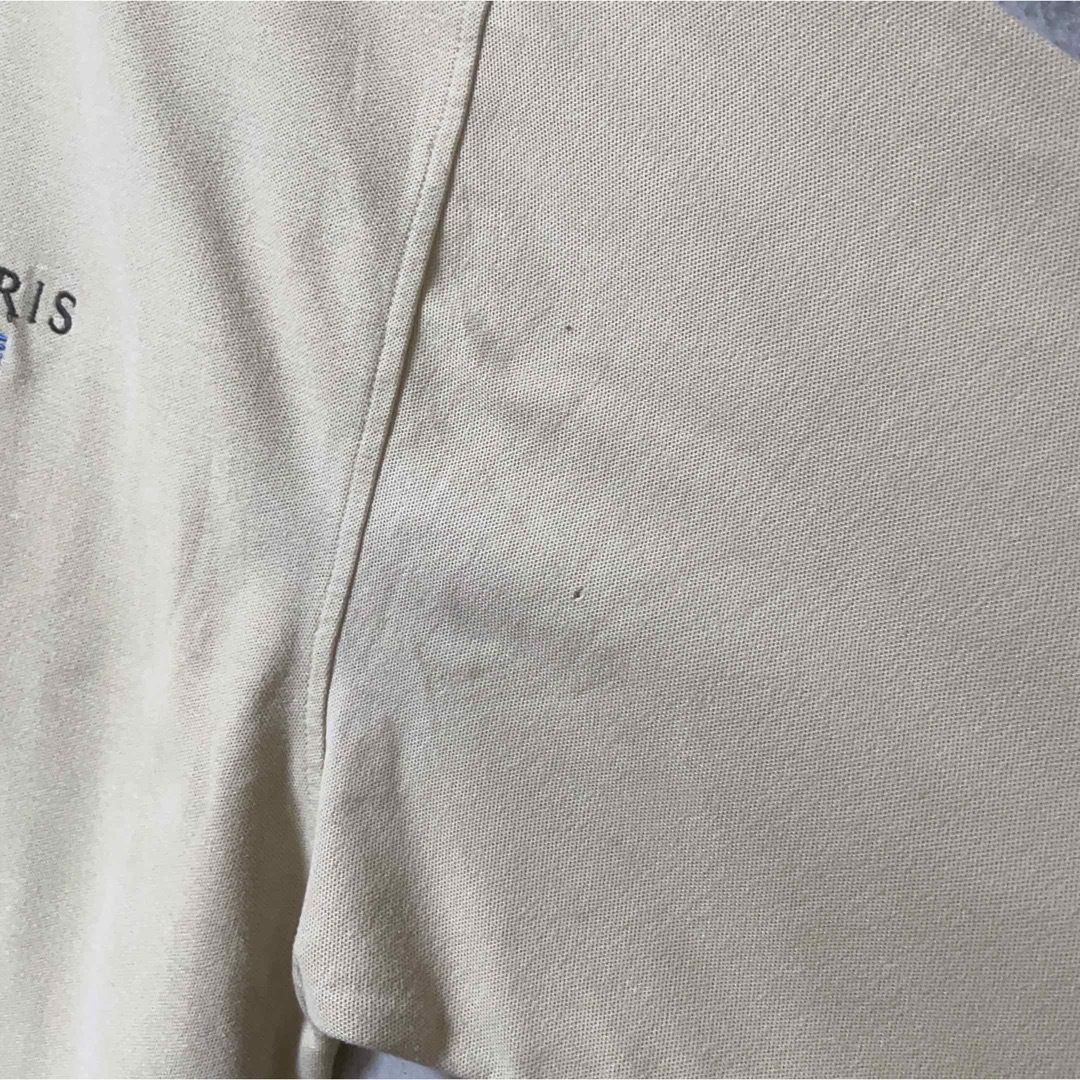 ポロシャツ　ベージュ　半袖　STERIS　USA古着　企業　ロゴ　ワンポイント メンズのトップス(ポロシャツ)の商品写真