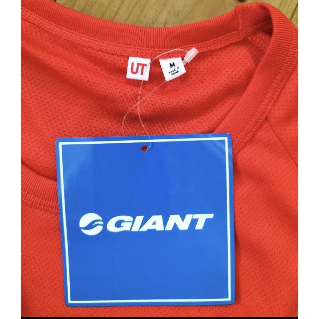 UNIQLO(ユニクロ)の未使用　GIANT ジャイアント　UT Tシャツ Ｍサイズ　オレンジ/グレー メンズのトップス(Tシャツ/カットソー(半袖/袖なし))の商品写真