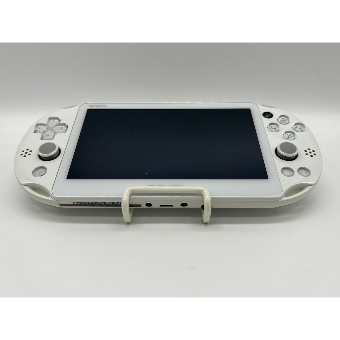 PlayStation Vita(プレイステーションヴィータ)の【ほぼ完品・液晶美品】PS Vita PCH-2000 ホワイト 本体 ソニー エンタメ/ホビーのゲームソフト/ゲーム機本体(携帯用ゲーム機本体)の商品写真