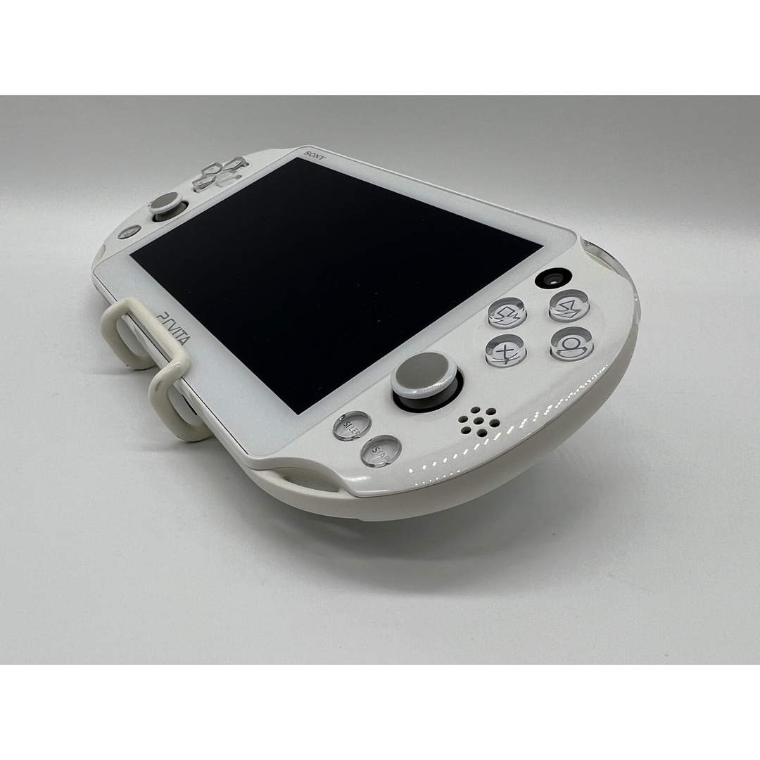 PlayStation Vita(プレイステーションヴィータ)の【ほぼ完品・液晶美品】PS Vita PCH-2000 ホワイト 本体 ソニー エンタメ/ホビーのゲームソフト/ゲーム機本体(携帯用ゲーム機本体)の商品写真