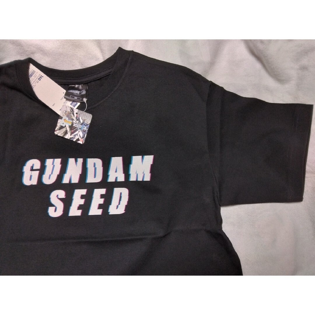 GU(ジーユー)のバックプリントGUガンダムSEED黒160サイズtシャツ160サイズ エンタメ/ホビーのおもちゃ/ぬいぐるみ(キャラクターグッズ)の商品写真