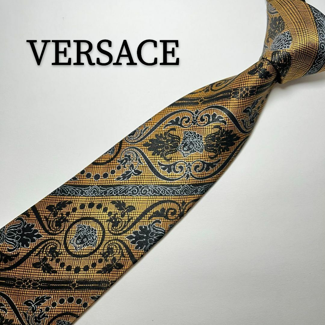 VERSACE(ヴェルサーチ)のヴェルサーチ VERSACE シルク ゴールド ボタニカル メデューサ ロゴ 黒 メンズのファッション小物(ネクタイ)の商品写真