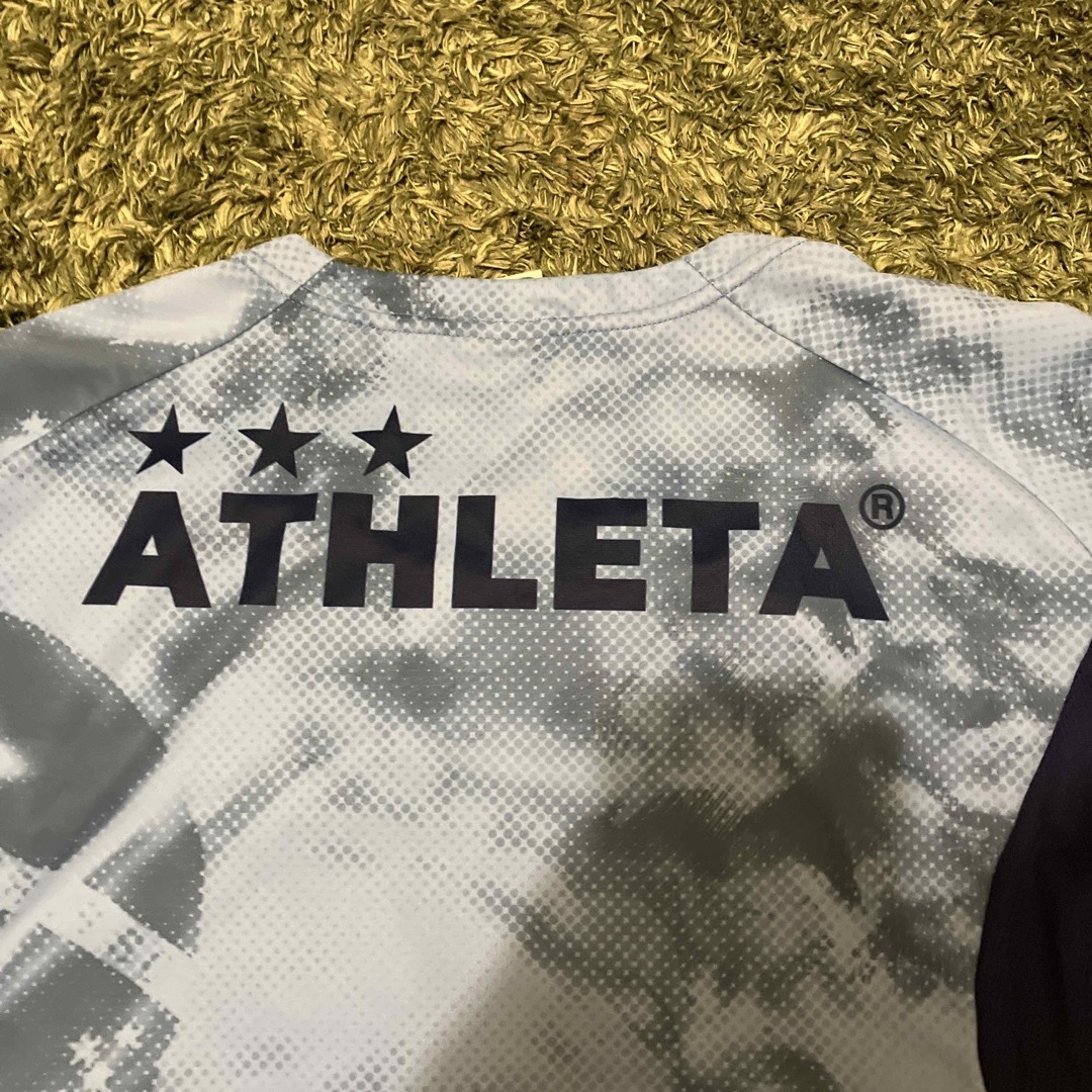 ATHLETA(アスレタ)のカマタマーレ讃岐　半袖夏用L スポーツ/アウトドアのサッカー/フットサル(応援グッズ)の商品写真