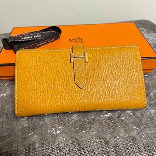 エルメス(Hermes)のHERMESベアン　3つ折り長財布　ゴールド金具　イエロー　オレンジ(財布)