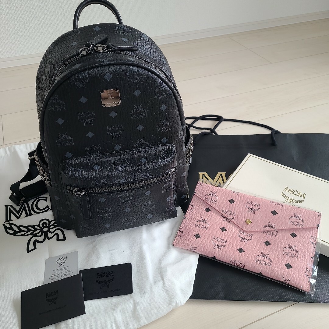 MCM スタッズ付きリュック ノベルティポーチ付き-tops.edu.ng