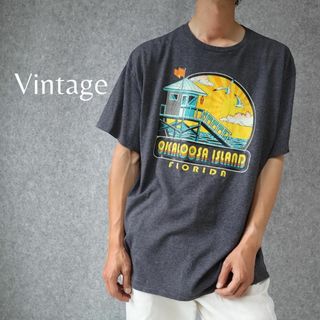 アートヴィンテージ(ART VINTAGE)の【vintage】オカルーサ・アイランド イラスト プリント ルーズ Tシャツ(Tシャツ/カットソー(半袖/袖なし))