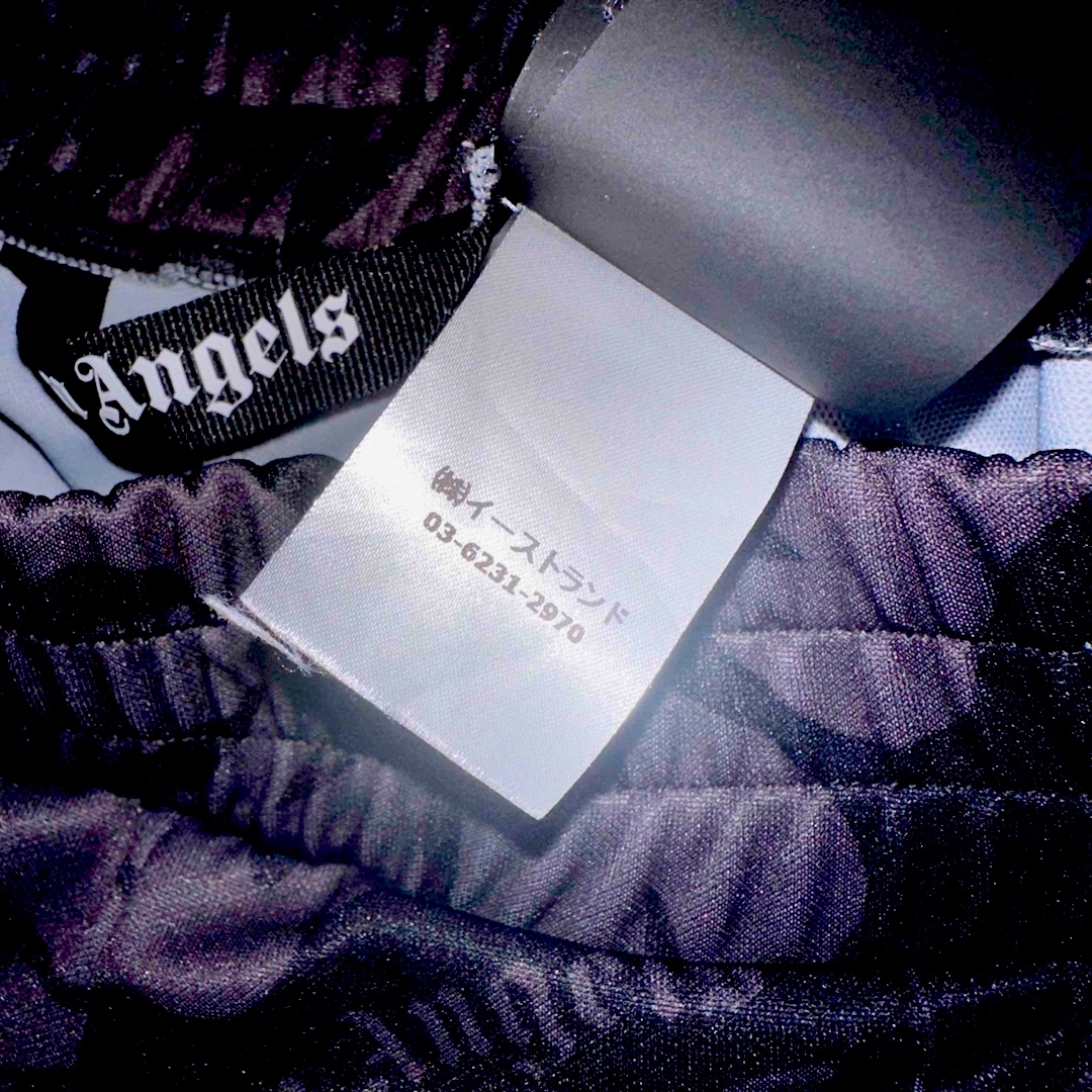 PALM ANGELS(パームエンジェルス)の人気完売品　palm angels トラックパンツ メンズのパンツ(その他)の商品写真