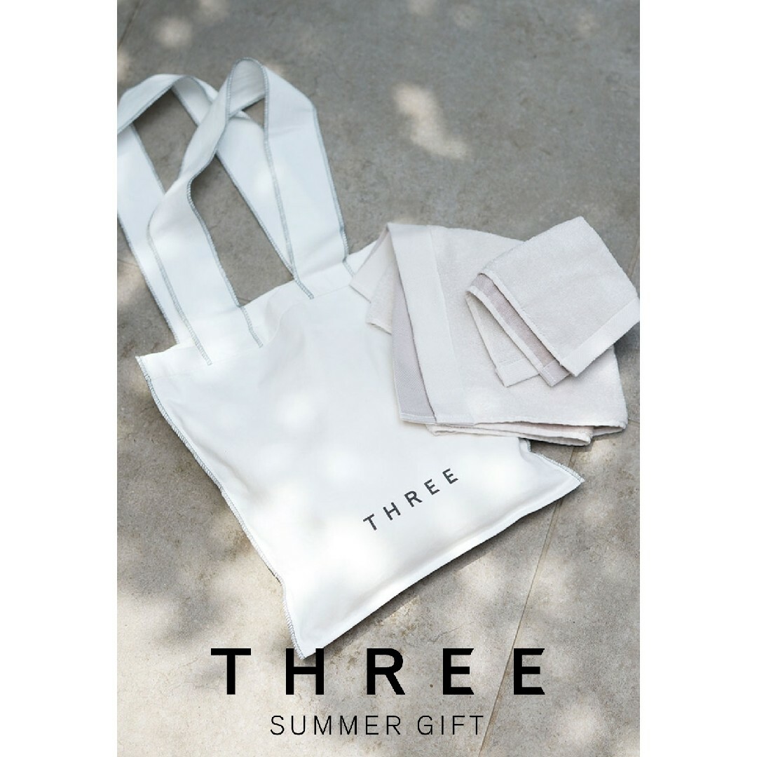 THREE(スリー)のリーフ様❤新品未開封❤THREE リバーシブルタオル＆ステッチバッグセット エンタメ/ホビーのコレクション(ノベルティグッズ)の商品写真