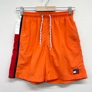 US古着 トミーヒルフィガー TOMMY HILFIGER ナイロン スイム ショートパンツ ボードショーツ クレイジーパターン ロゴ パッチ ひざ上 サイズ：W25～ オレンジ×レッド×ホワイト×ネイビー  【中古】(スラックス/スーツパンツ)