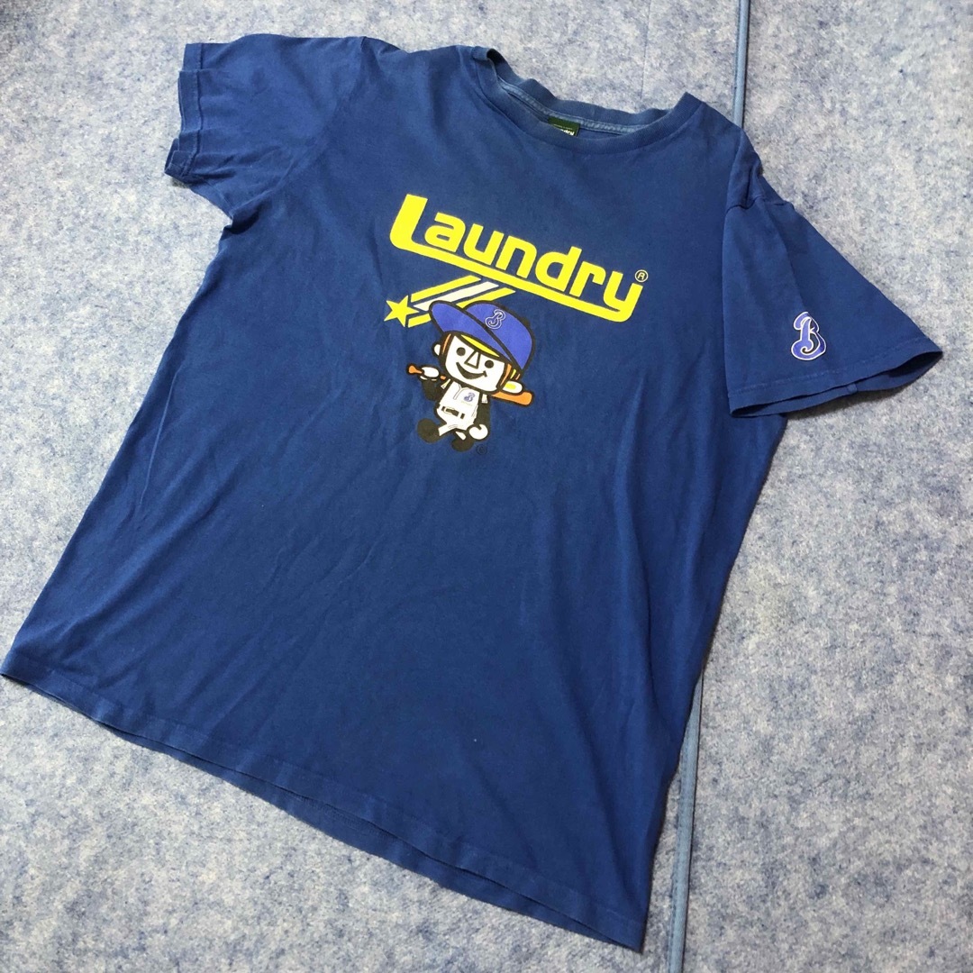 横浜DeNAベイスターズ(ヨコハマディーエヌエーベイスターズ)の横浜ベイスターズ　ランドリー　laundry Tシャツ　青　半袖　Lサイズ スポーツ/アウトドアの野球(応援グッズ)の商品写真