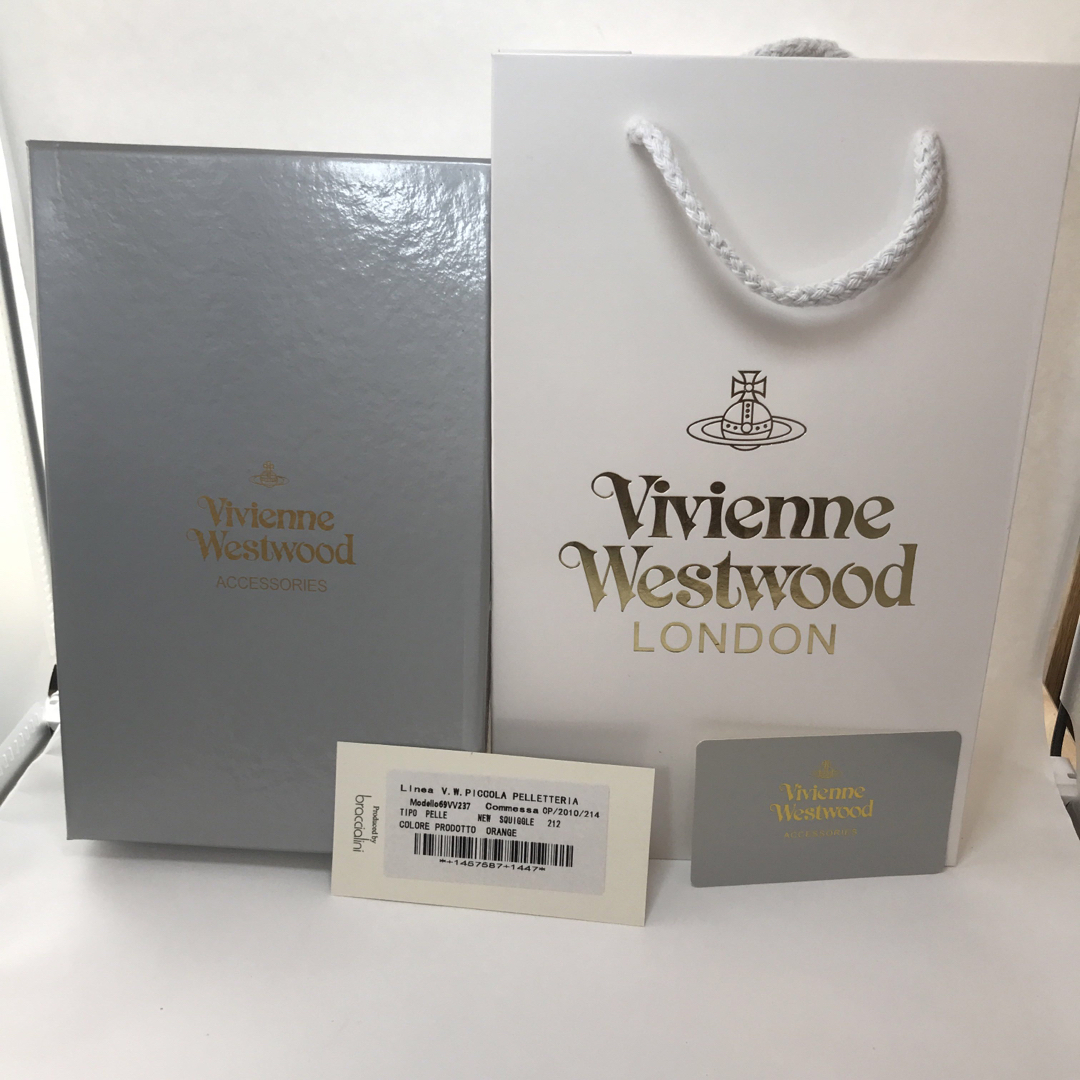 Vivienne Westwood(ヴィヴィアンウエストウッド)の【新品未使用】Vivienne westwood 長財布オレンジ/ブルー レディースのファッション小物(財布)の商品写真