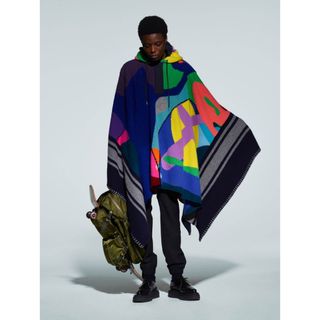 サカイ(sacai)のsacai×kawsコラボポンチョ2021-22年秋冬コレクション(ポンチョ)