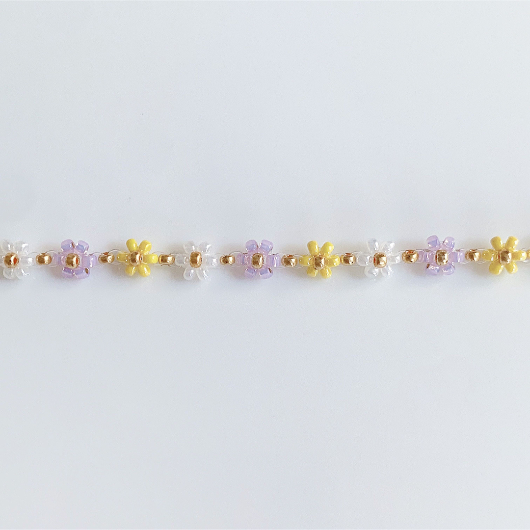 韓国ビーズ♡フラワーブレスレット＼White×Purple×yellow／の通販 by n＊flower accessory｜ラクマ