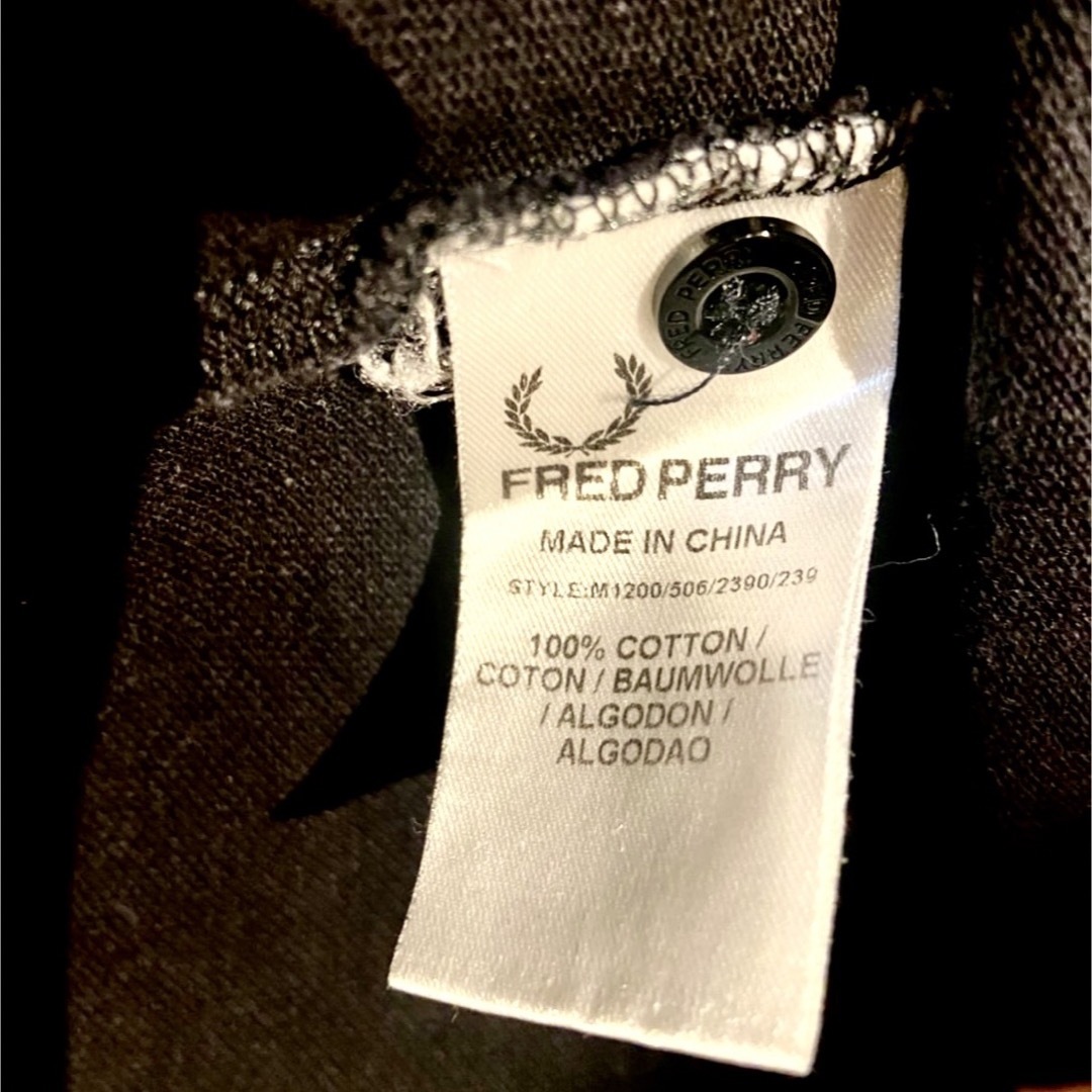 FRED PERRY(フレッドペリー)のフレッドペリー FRED PERRY 半袖 ポロシャツ ブラック イエロー 古着 メンズのトップス(ポロシャツ)の商品写真