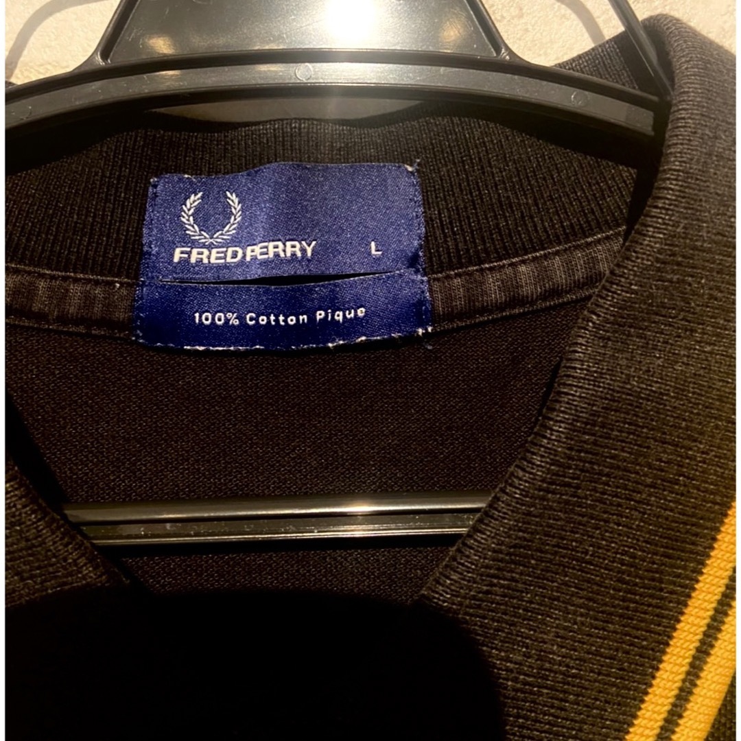 FRED PERRY(フレッドペリー)のフレッドペリー FRED PERRY 半袖 ポロシャツ ブラック イエロー 古着 メンズのトップス(ポロシャツ)の商品写真