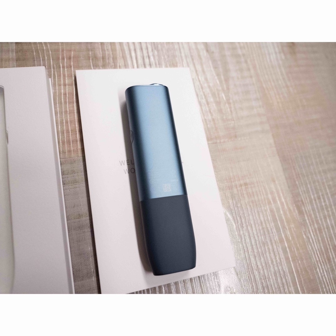 IQOS(アイコス)のIQOS ILUMA ONE (アイコス イルマワン) アズールブルー 女性使用 メンズのファッション小物(タバコグッズ)の商品写真