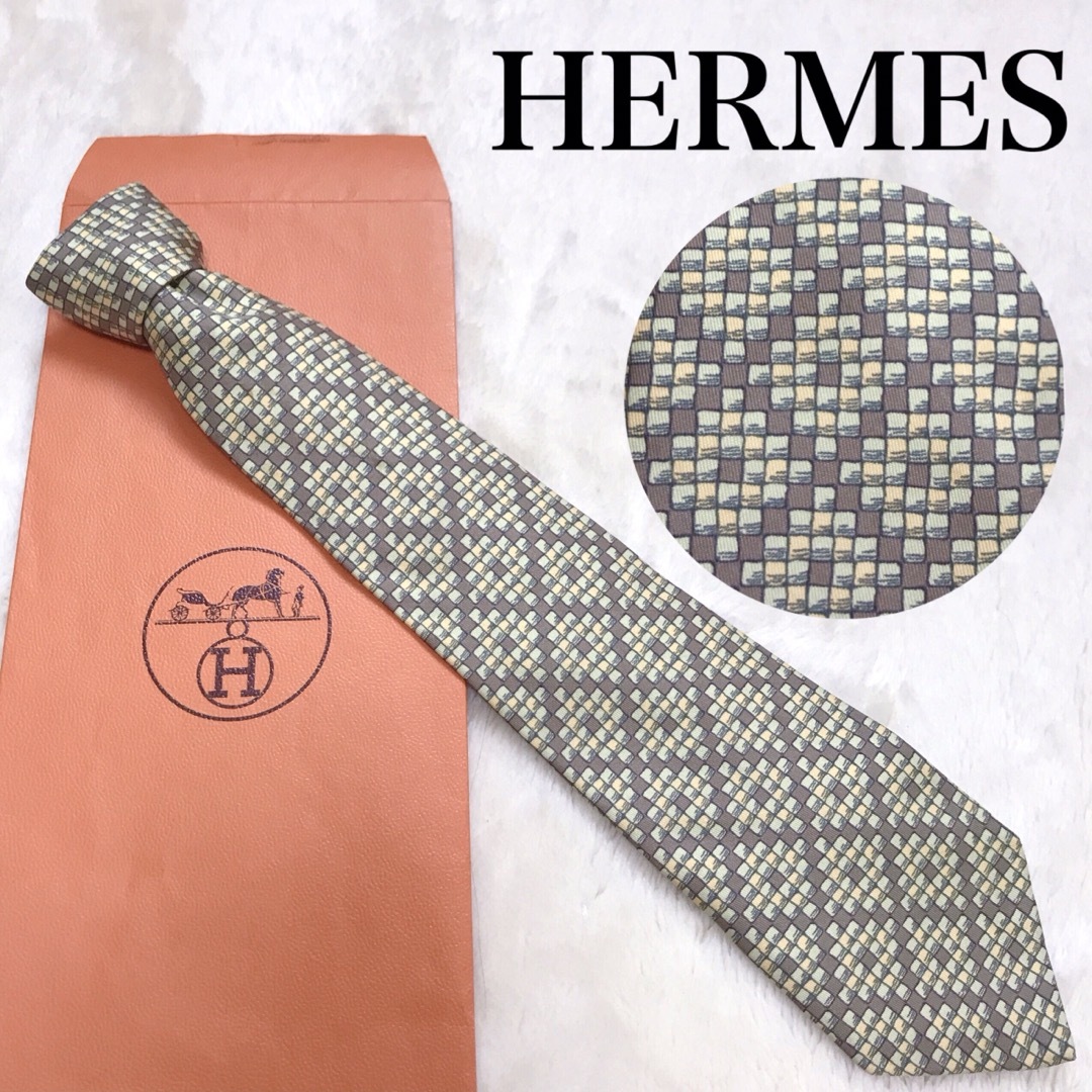 Hermes(エルメス)のHERMES エルメス ネクタイ 総柄 マルチカラー 馬車 シルク 茶色 緑 黄 メンズのファッション小物(ネクタイ)の商品写真
