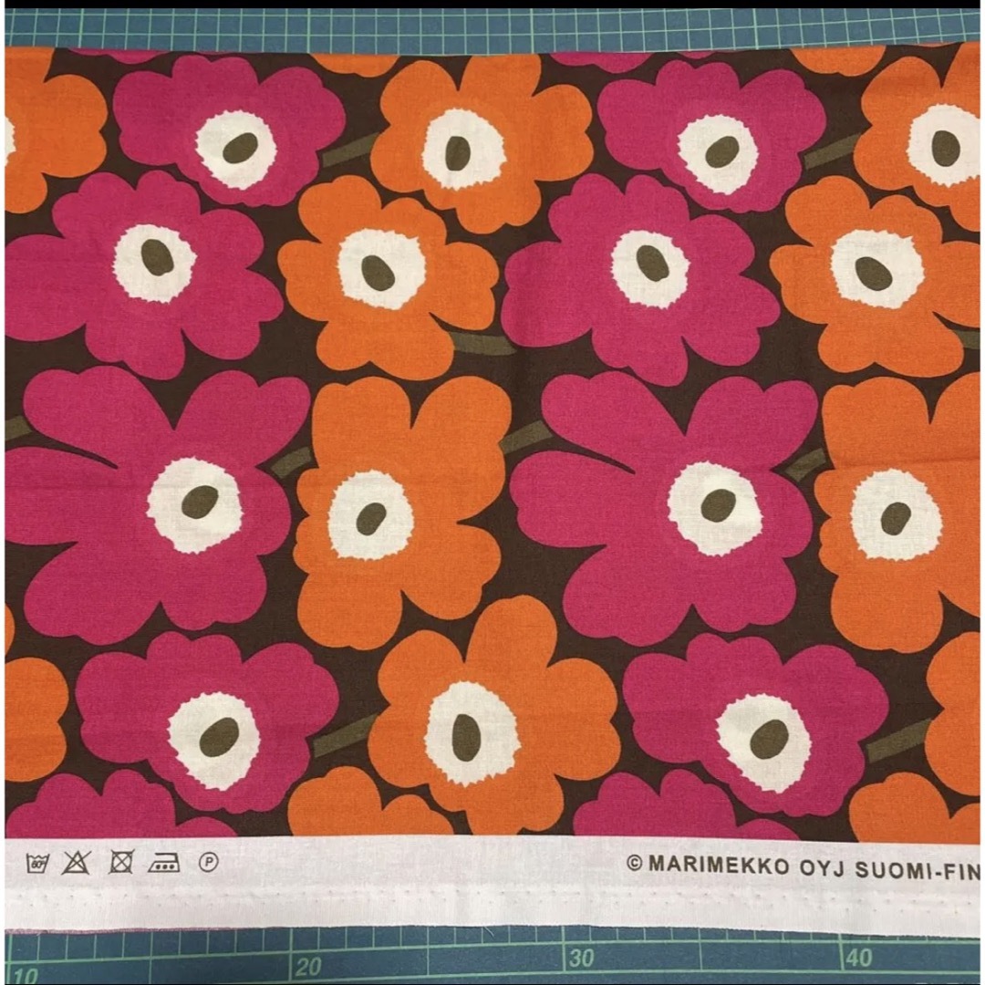 marimekko(マリメッコ)の⭐️キープ 廃番レア マリメッコ 生地 ミニウニッコ ブラウンオレンジ ハンドメイドの素材/材料(生地/糸)の商品写真