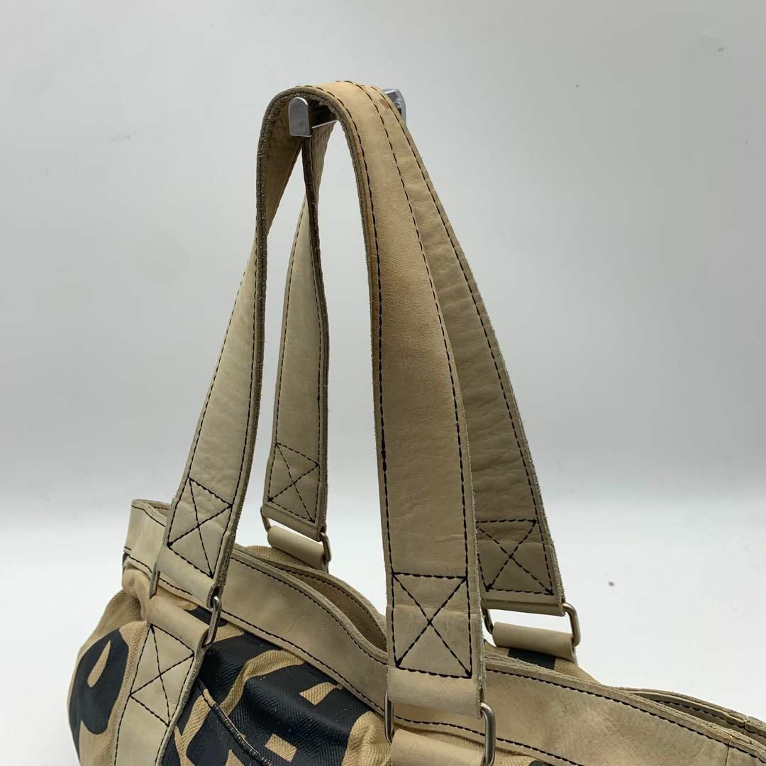 Vivienne Westwood(ヴィヴィアンウエストウッド)のヴィヴィアン ウエストウッド キャンバス　レザー トートバッグ 総柄 レディースのバッグ(トートバッグ)の商品写真