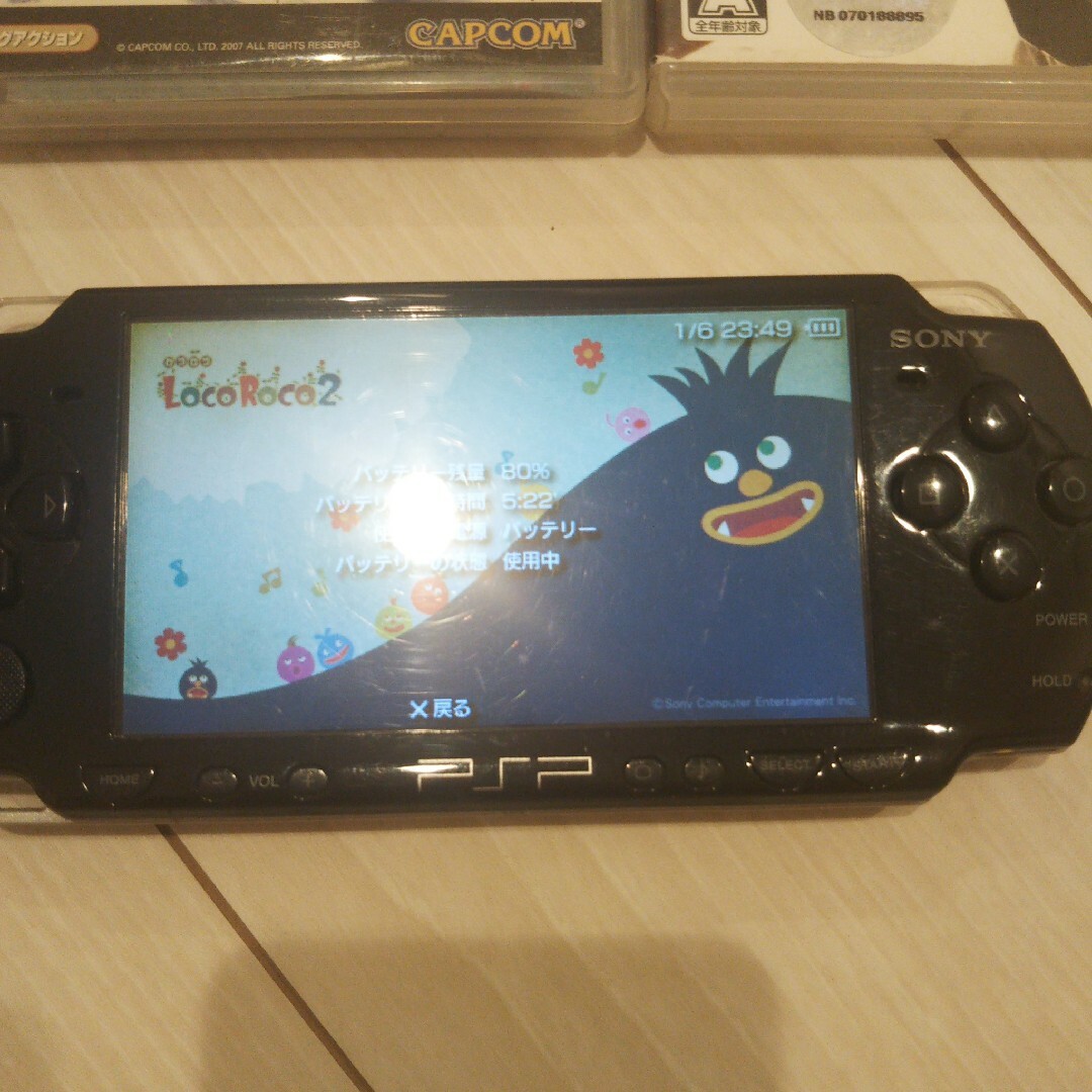 PlayStation Portable(プレイステーションポータブル)のジュウザ様専用  ⭐️psp2000本体♪黒３。新品バッテリー、ゲーム２つ付き♪ エンタメ/ホビーのゲームソフト/ゲーム機本体(家庭用ゲーム機本体)の商品写真