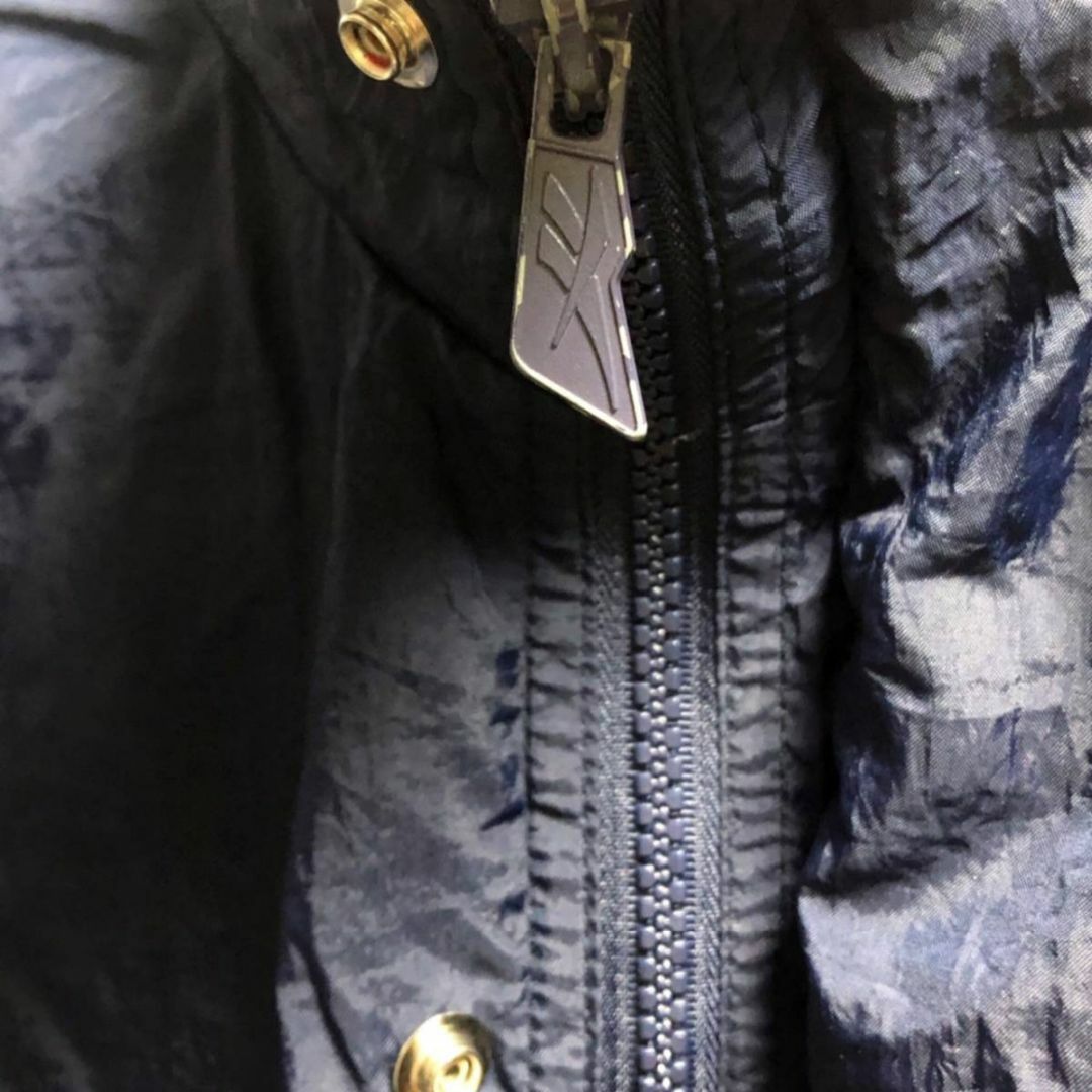 Reebok(リーボック)の90年代ビンテージ REEBOK ベクター トラックジャケット 唾寄着用 メンズのジャケット/アウター(ナイロンジャケット)の商品写真