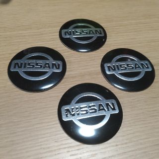 ニッサン(日産)の日産アルミホイールセンターキャップステッカー4p激安価格に付き値引き不可(ホイール)