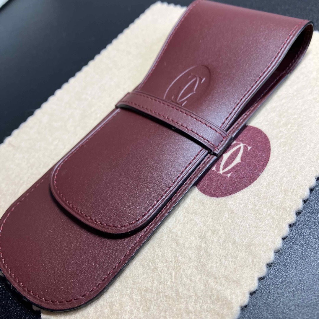 Cartier(カルティエ)の【未使用 正規品】 カルティエ ペンケース レザー 本革 ボルドー 小物入れ レディースのファッション小物(ポーチ)の商品写真